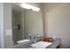 Bathroom featuring a sleek vanity with a modern sink, subway tile backsplash, and a large mirror at 5225 Kings Hwy, Douglasville, GA 30135