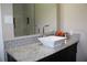 Stylish bathroom featuring a modern sink, granite countertop, and subway tile accents at 5225 Kings Hwy, Douglasville, GA 30135