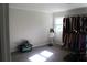 Spacious bedroom featuring a window and clothing rack at 5225 Kings Hwy, Douglasville, GA 30135