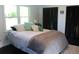 Bedroom with dark wood floors, ample natural light, and a closet at 5225 Kings Hwy, Douglasville, GA 30135
