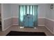 Inviting room with soft blue curtains and a charming blue cabinet, creating a serene space at 5225 Kings Hwy, Douglasville, GA 30135