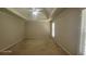 Spacious bedroom with a ceiling fan and tray ceiling, offering a bright and airy feel at 3219 Roundfield Cir, Duluth, GA 30096