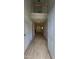 Inviting foyer featuring hardwood floors, closet, and a view of the upper level at 3219 Roundfield Cir, Duluth, GA 30096