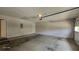 Spacious garage with overhead door, concrete flooring, and room for parking and storage at 3219 Roundfield Cir, Duluth, GA 30096