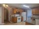 Kitchen showcases granite countertops, modern appliances, and hardwood flooring at 3219 Roundfield Cir, Duluth, GA 30096