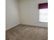 Bedroom with carpet floors, neutral paint and a window with a curtain at 5035 Harbor Ridge Dr, Buford, GA 30518