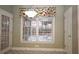 Inviting breakfast nook with garden views, tiled flooring, and ample natural light at 5035 Harbor Ridge Dr, Buford, GA 30518
