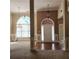 Spacious living room with hardwood floors and views into the dining room at 5035 Harbor Ridge Dr, Buford, GA 30518
