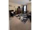 Comfortable bedroom showcasing a sitting area, dark wood furniture and neutral carpet at 2435 Hickory Station Cir, Snellville, GA 30078