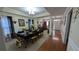 Elegant dining room with hardwood floors, perfect for entertaining guests and enjoying Gathering meals at 2435 Hickory Station Cir, Snellville, GA 30078