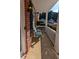 Inviting front porch with a chair, perfect for relaxing and enjoying the neighborhood views at 2435 Hickory Station Cir, Snellville, GA 30078