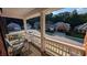 Charming front porch view of the neighborhood with comfortable seating at 2435 Hickory Station Cir, Snellville, GA 30078