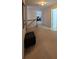 Bright upper hallway featuring neutral carpeting and access to various rooms at 2435 Hickory Station Cir, Snellville, GA 30078