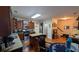 Spacious kitchen features granite countertops, a kitchen island, and wooden cabinets at 2435 Hickory Station Cir, Snellville, GA 30078