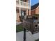 Close-up of a decorative mailbox with the house number '2435' displayed on a wrought iron post at 2435 Hickory Station Cir, Snellville, GA 30078