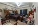 Spacious main bedroom with tray ceilings and a large bed with wooden furniture at 2435 Hickory Station Cir, Snellville, GA 30078
