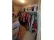 Spacious walk-in closet featuring ample storage space for clothes and accessories at 2435 Hickory Station Cir, Snellville, GA 30078