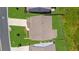 Aerial view showing the roof of a home, a paved driveway, and green lawns at 349 Garnet Dr, Acworth, GA 30101