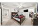 Bedroom featuring carpeted floors, fan, and easy access to large walk-in closet at 349 Garnet Dr, Acworth, GA 30101