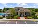 Community clubhouse with well-manicured landscaping and accessible entrance offers a place for gathering and activities at 349 Garnet Dr, Acworth, GA 30101