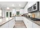 Beautiful kitchen with granite counters, stainless appliances, and plenty of counter space at 349 Garnet Dr, Acworth, GA 30101