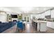 Modern kitchen open to the living room with a large island and stainless steel appliances at 349 Garnet Dr, Acworth, GA 30101