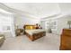 Spacious main bedroom with tray ceiling, carpet floors, and large windows providing plenty of natural light at 349 Garnet Dr, Acworth, GA 30101