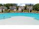 Large community pool with various seating areas and view of the homes in the neighborhood at 349 Garnet Dr, Acworth, GA 30101