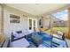 Relaxing covered porch with comfortable seating and stylish decor, perfect for outdoor enjoyment at 349 Garnet Dr, Acworth, GA 30101