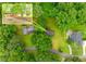 Overhead shot of the property showcasing lush landscaping and tree coverage at 3927 Buck Rd, Powder Springs, GA 30127