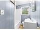 Bathroom includes shower-tub combo and a window at 3927 Buck Rd, Powder Springs, GA 30127