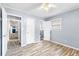 Bedroom with laminate flooring and multiple doors at 3927 Buck Rd, Powder Springs, GA 30127