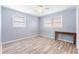 Bedroom with laminate flooring, ceiling fan, and one window at 3927 Buck Rd, Powder Springs, GA 30127