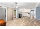 Kitchen area featuring white cabinets, modern appliances, and view to deck at 3927 Buck Rd, Powder Springs, GA 30127