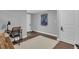 Basement room with a small desk, neutral carpet, grey paint, and ample space for a variety of uses at 2994 Baker Ridge Nw Dr, Atlanta, GA 30318