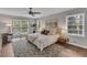 Tranquil main bedroom with ample natural light, neutral tones, and comfortable furnishings at 2994 Baker Ridge Nw Dr, Atlanta, GA 30318