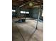 Interior of the cinderblock garage displaying the bare concrete floor and block wall construction at 6674 Cowan Mill Rd, Winston, GA 30187