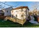 A spacious backyard showcasing a wooden deck and manicured lawn at 83 Ormond Se St, Atlanta, GA 30315
