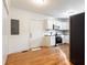 Bright kitchen featuring white cabinets, stainless steel appliances, and hardwood floors at 83 Ormond Se St, Atlanta, GA 30315