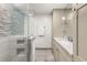 Modern bathroom featuring tiled shower and vanity with lots of storage space and sleek fixtures at 2110 Augusta Se Dr # 204, Marietta, GA 30067