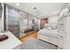 Bright bedroom with mirrored closet doors, modern decor, and ample natural light at 2110 Augusta Se Dr # 204, Marietta, GA 30067