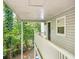 Inviting front porch featuring white railings, siding, and a glimpse of the home's entrance at 2110 Augusta Se Dr # 204, Marietta, GA 30067