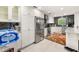 Bright kitchen showcasing white cabinetry, stainless steel appliances, and tiled floors at 2110 Augusta Se Dr # 204, Marietta, GA 30067