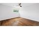 Bedroom with a window, hardwood floors, neutral walls and a ceiling fan at 383 Ralph Mcgill Ne Blvd # J, Atlanta, GA 30312