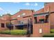 Brick townhome exterior with black wrought iron balconies and manicured landscaping at 383 Ralph Mcgill Ne Blvd # J, Atlanta, GA 30312