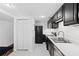 Clean kitchen with white and black appliances and light countertops at 383 Ralph Mcgill Ne Blvd # J, Atlanta, GA 30312