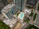 An amazing aerial shot showcasing a building with a rooftop pool area at 400 W Peachtree Nw St # 3711, Atlanta, GA 30308