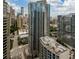 Great aerial view displaying high rise structures and downtown streets at 400 W Peachtree Nw St # 3711, Atlanta, GA 30308