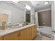Bathroom with a double sink vanity with granite countertops and tiled shower and tub at 400 W Peachtree Nw St # 3711, Atlanta, GA 30308