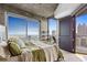 Bedroom with access to balcony, providing city views and natural light at 400 W Peachtree Nw St # 3711, Atlanta, GA 30308